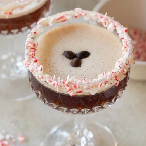 Peppermint espresso martini recipe with candy cane rim.