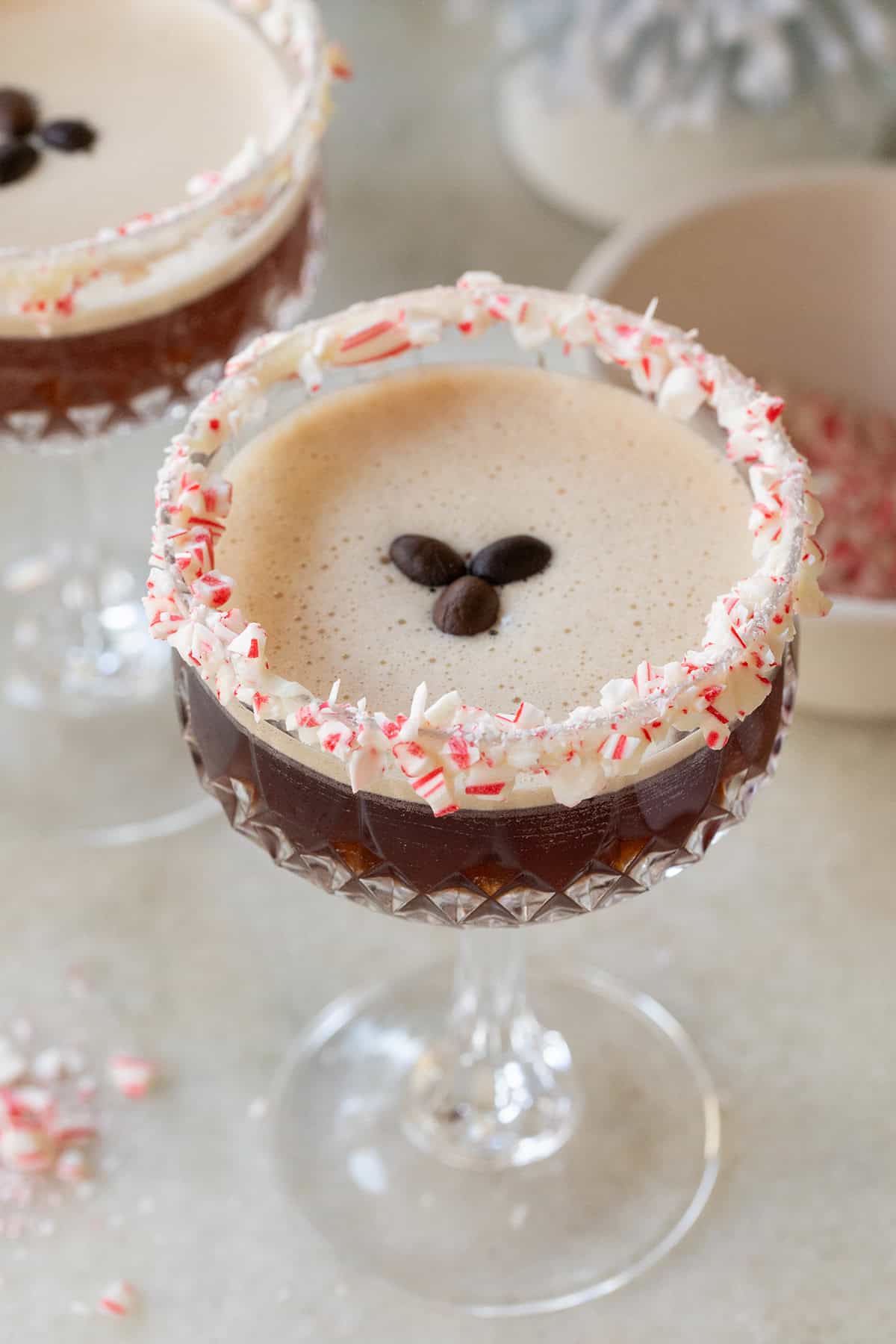 Peppermint espresso martini recipe with candy cane rim.