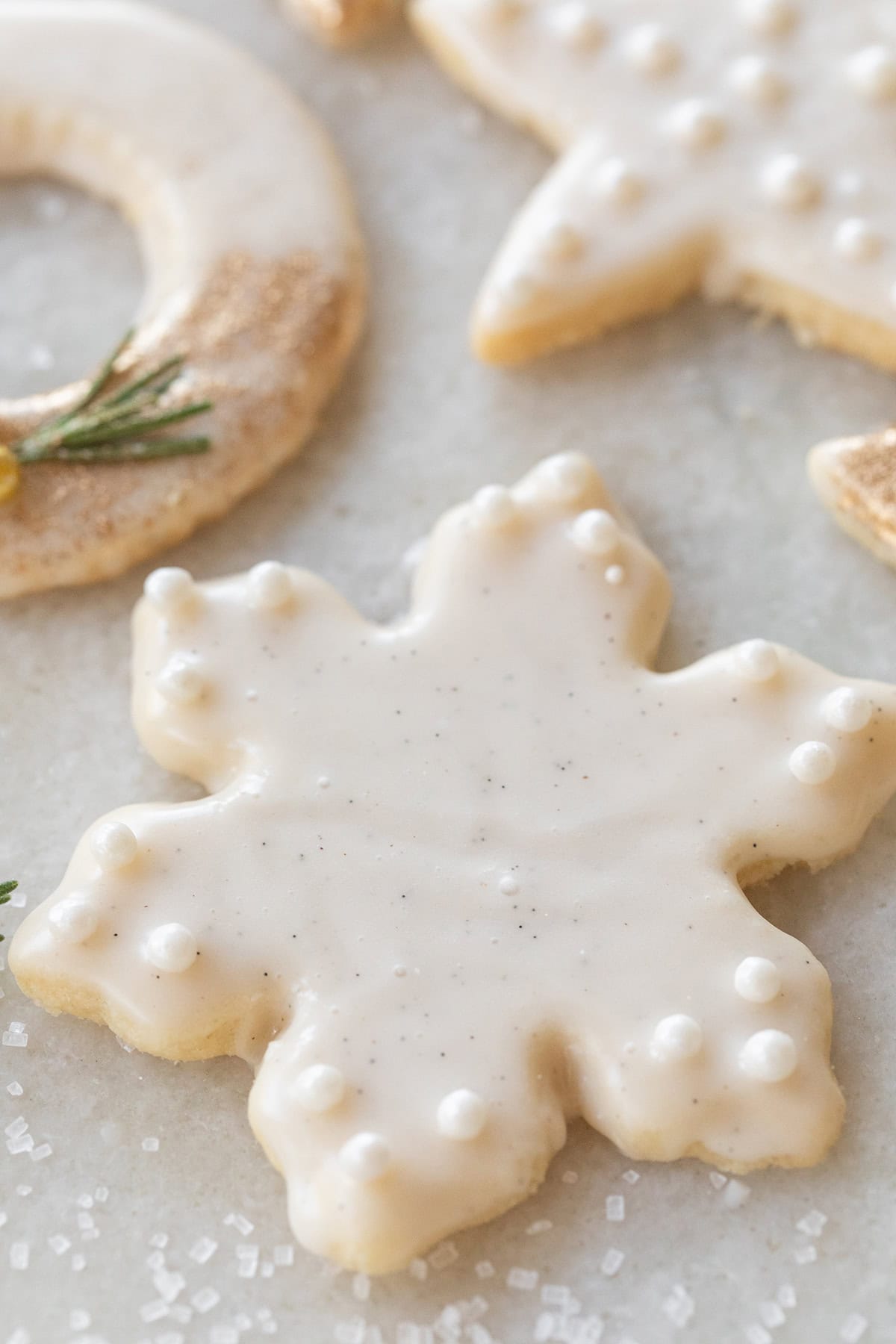 Snowflake shortbread cookie with vanilla glaze. 