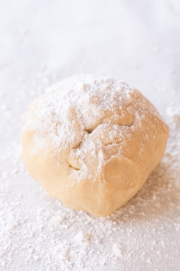 Shortbread cookie dough rolled into a ball. 