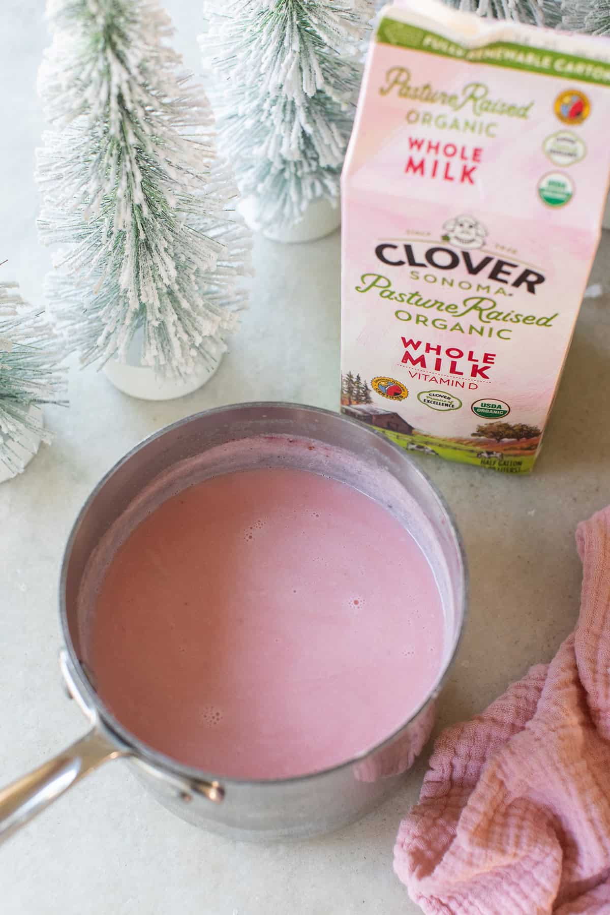 Pink hot chocolate in a saucepan. 