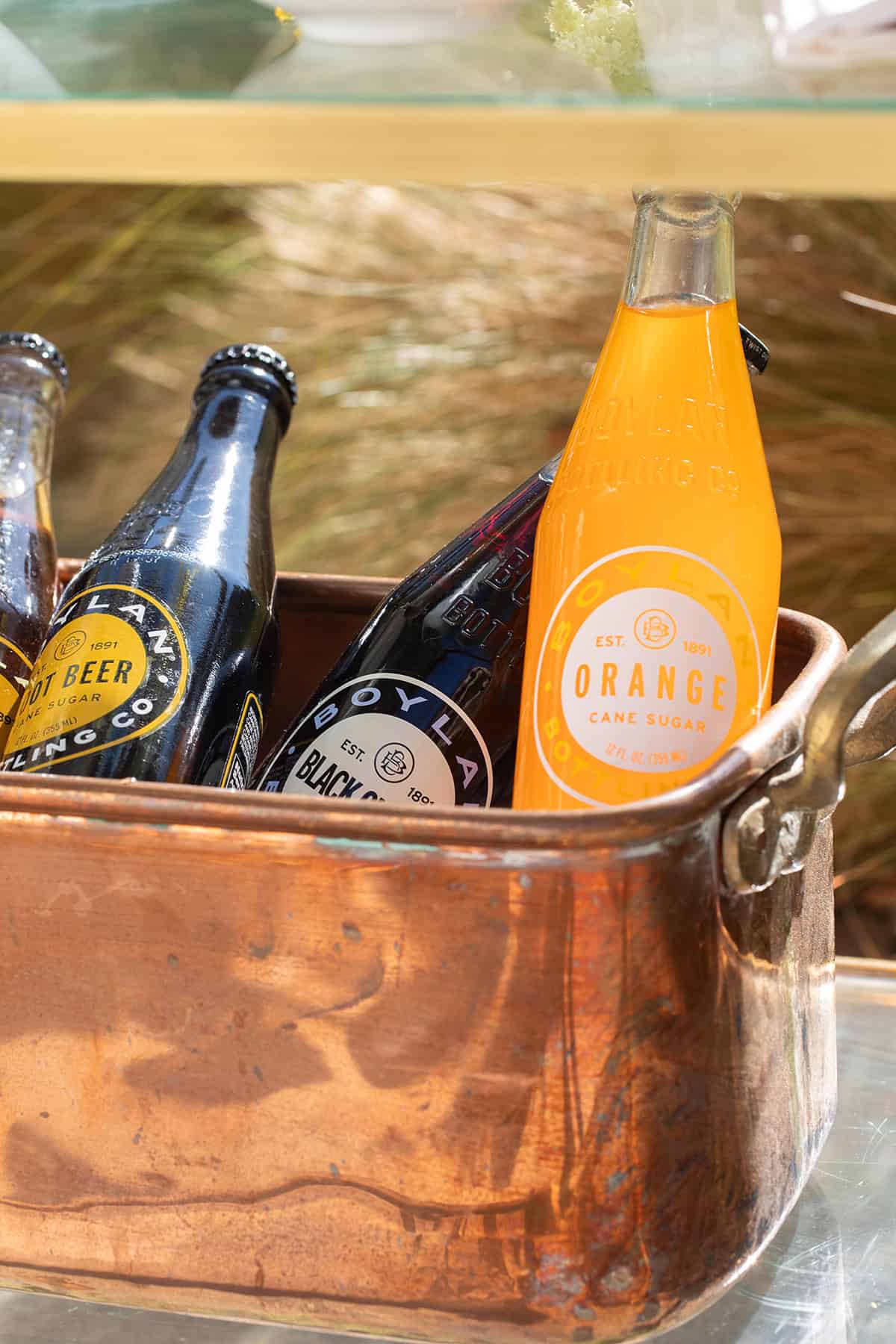 Classic sodas in a copper bin.