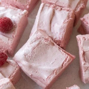 Fluffy homemade healthy marshmallows with raspberries.