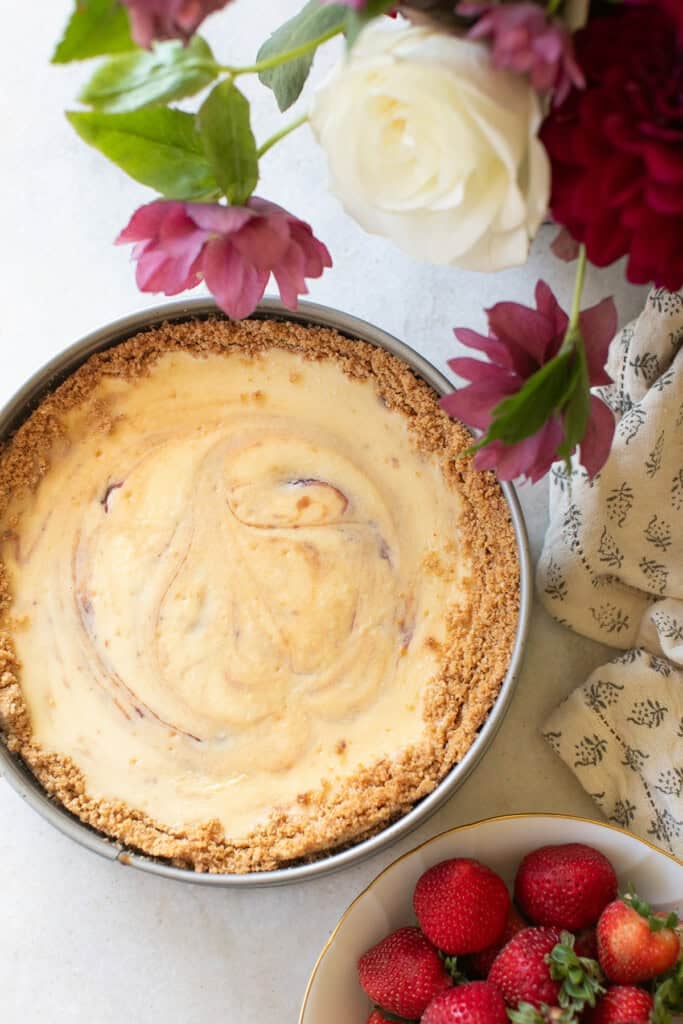 Baked strawberry cheesecake in a springform pan. 