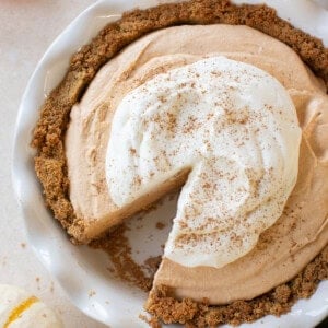 Pumpkin mousse pie with whipped cream.