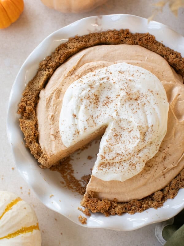 Pumpkin mousse pie with whipped cream.