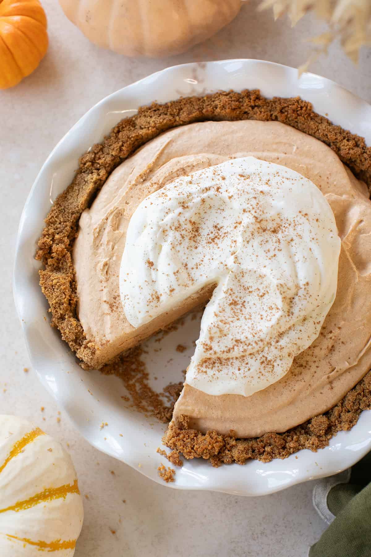 Pumpkin mousse pie with whipped cream.