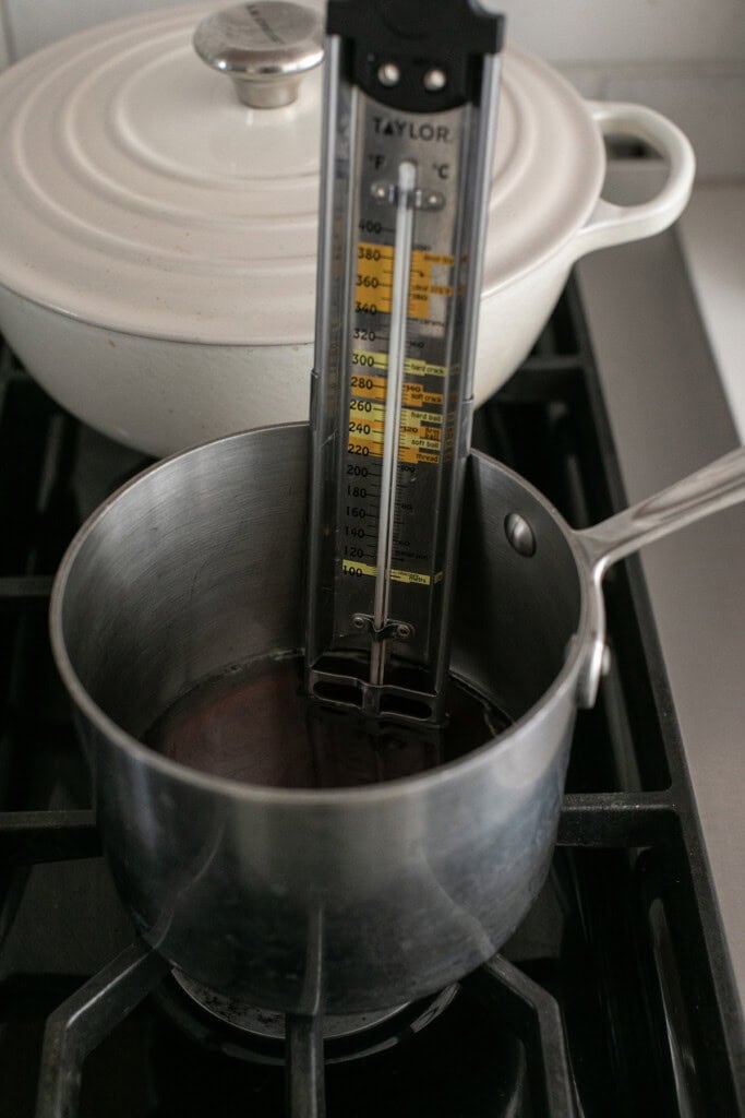 Boiling maple syrup to make marshmallows.