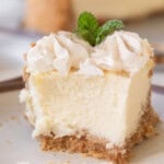 Bailey's Irish Cream Cheesecake Recipe with a slice taken out.
