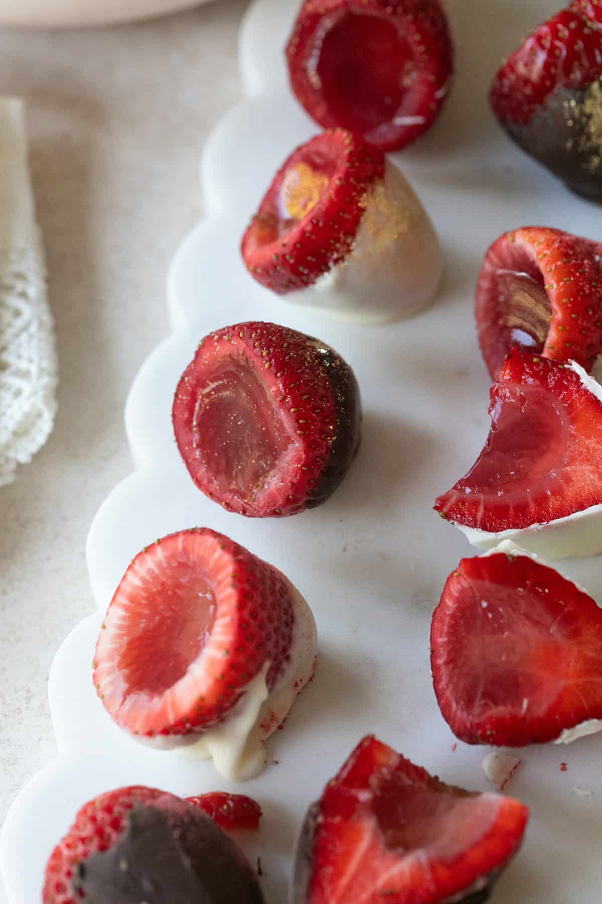 Strawberries filled with vanilla jello and then dipped in chocolate.