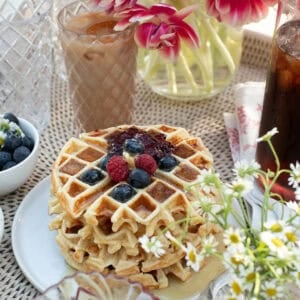 Belgian Waffle recipe on a tray with toppings.