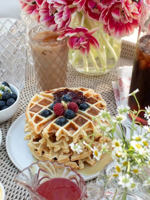 Belgian Waffle recipe on a tray with toppings.