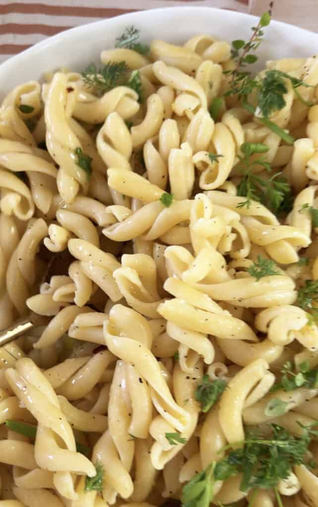 Lemon pasta served in a large bowl for easy entertaining.