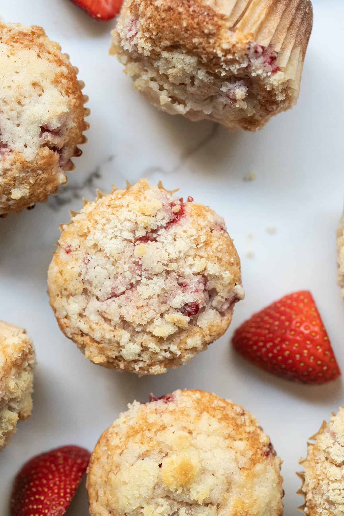 Fresh baked strawberry muffins with streusel topping.