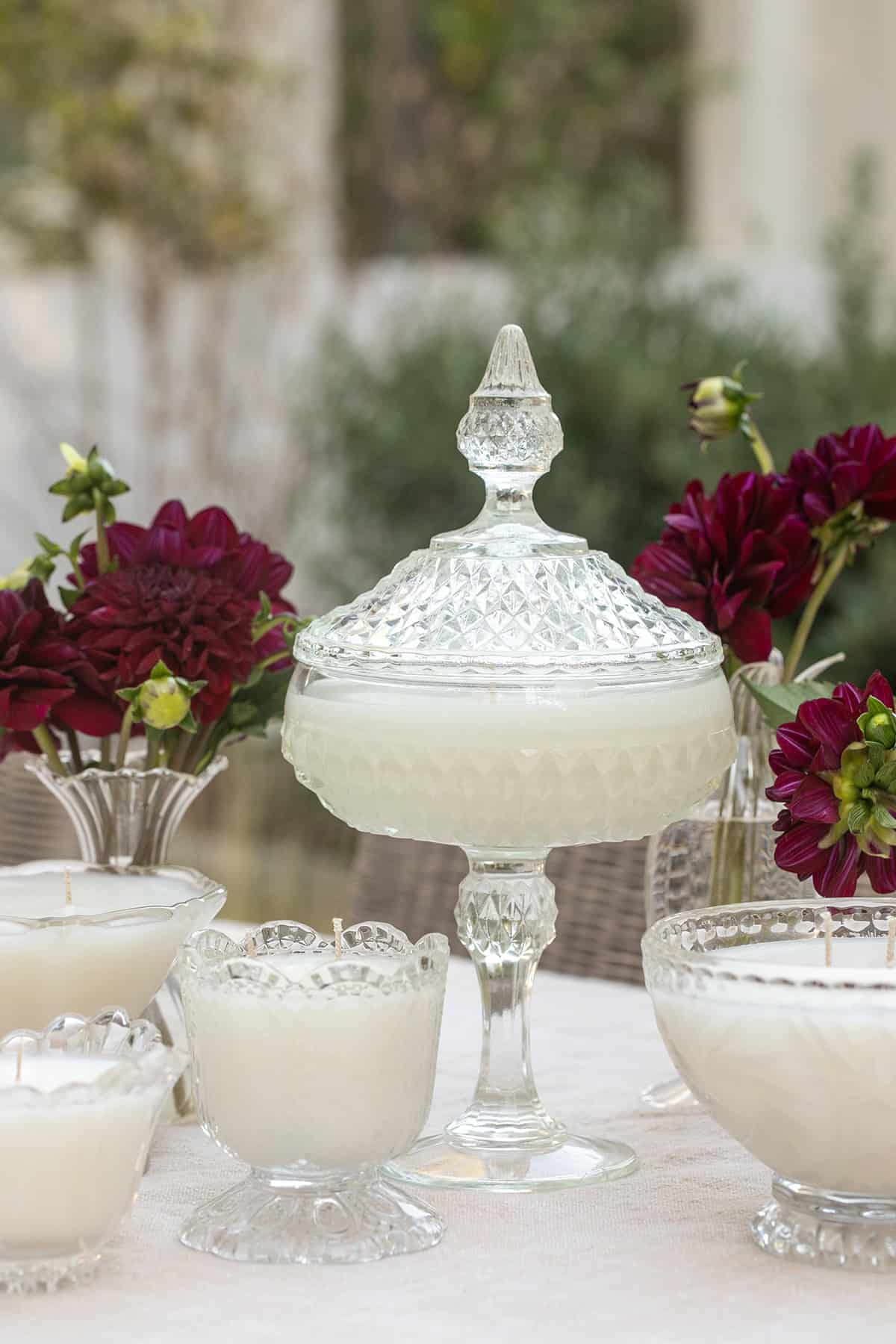Finished homemade candles in vintage glass.