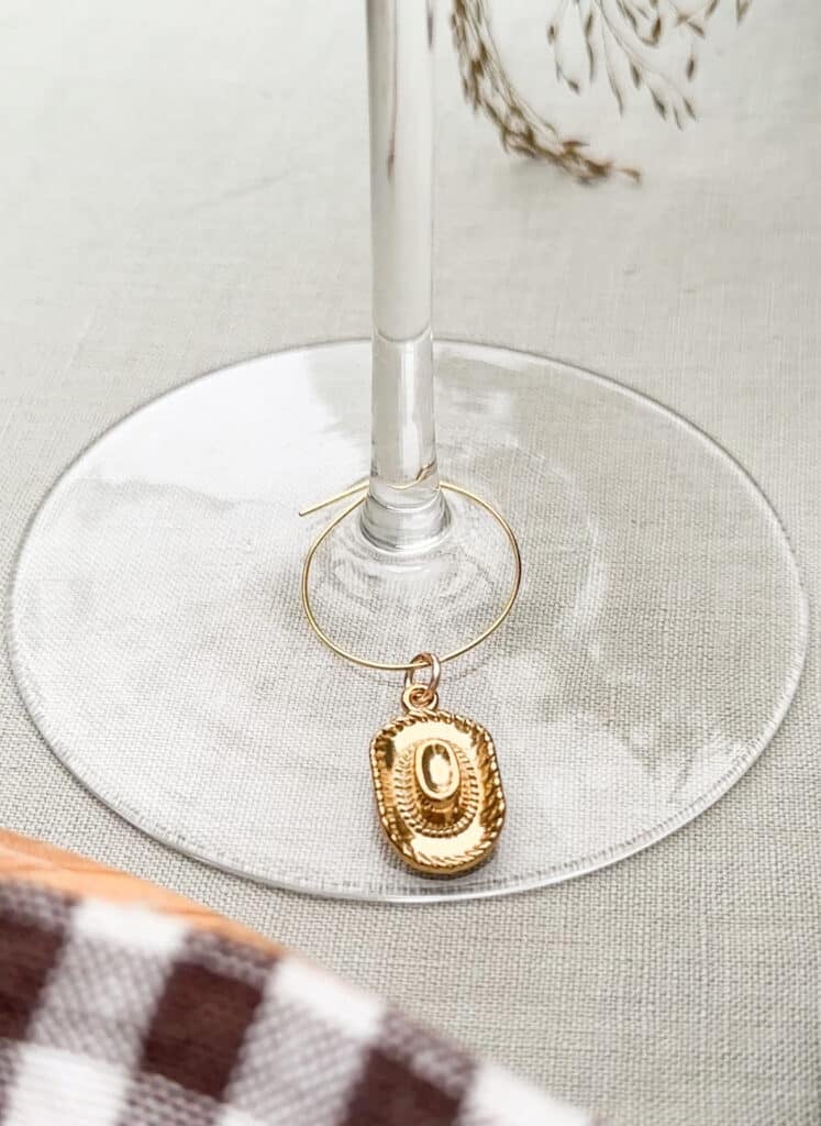 Cowboy hat wine charm.